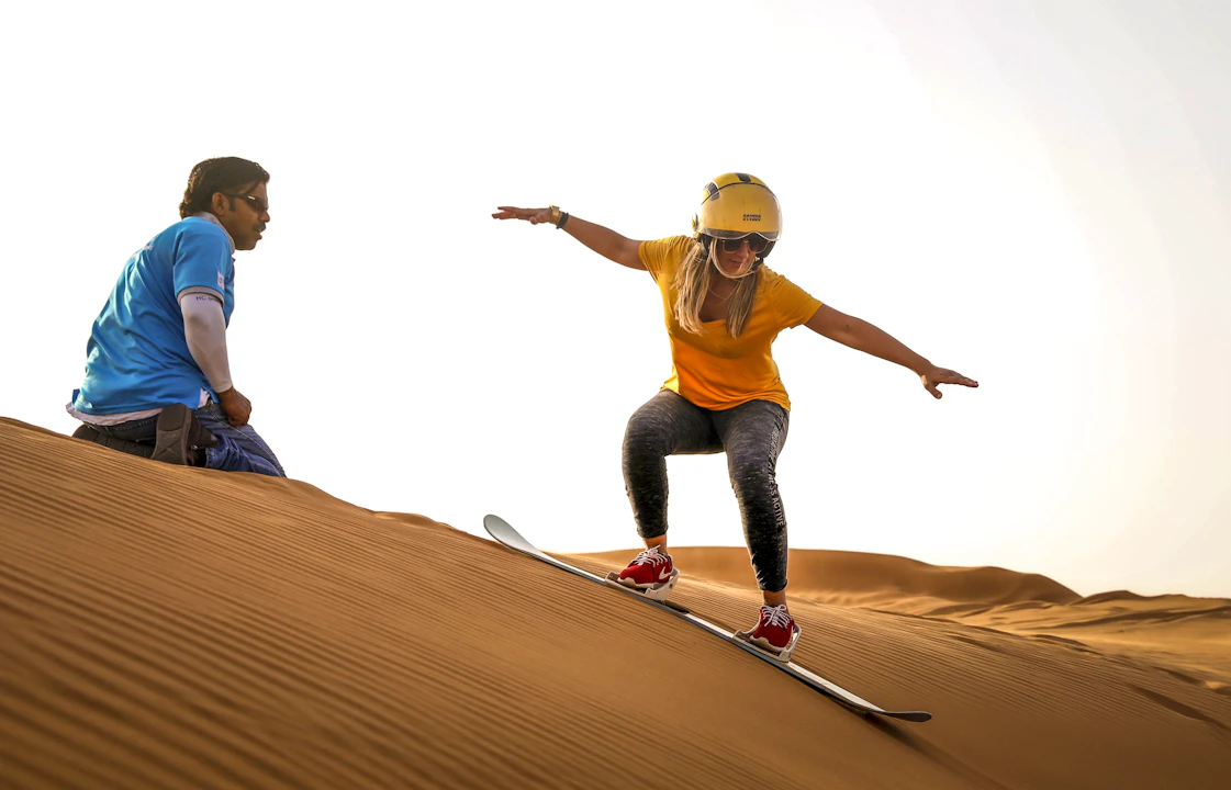 Premium Morning Quad Bike Sandboarding and Camel Ride Location